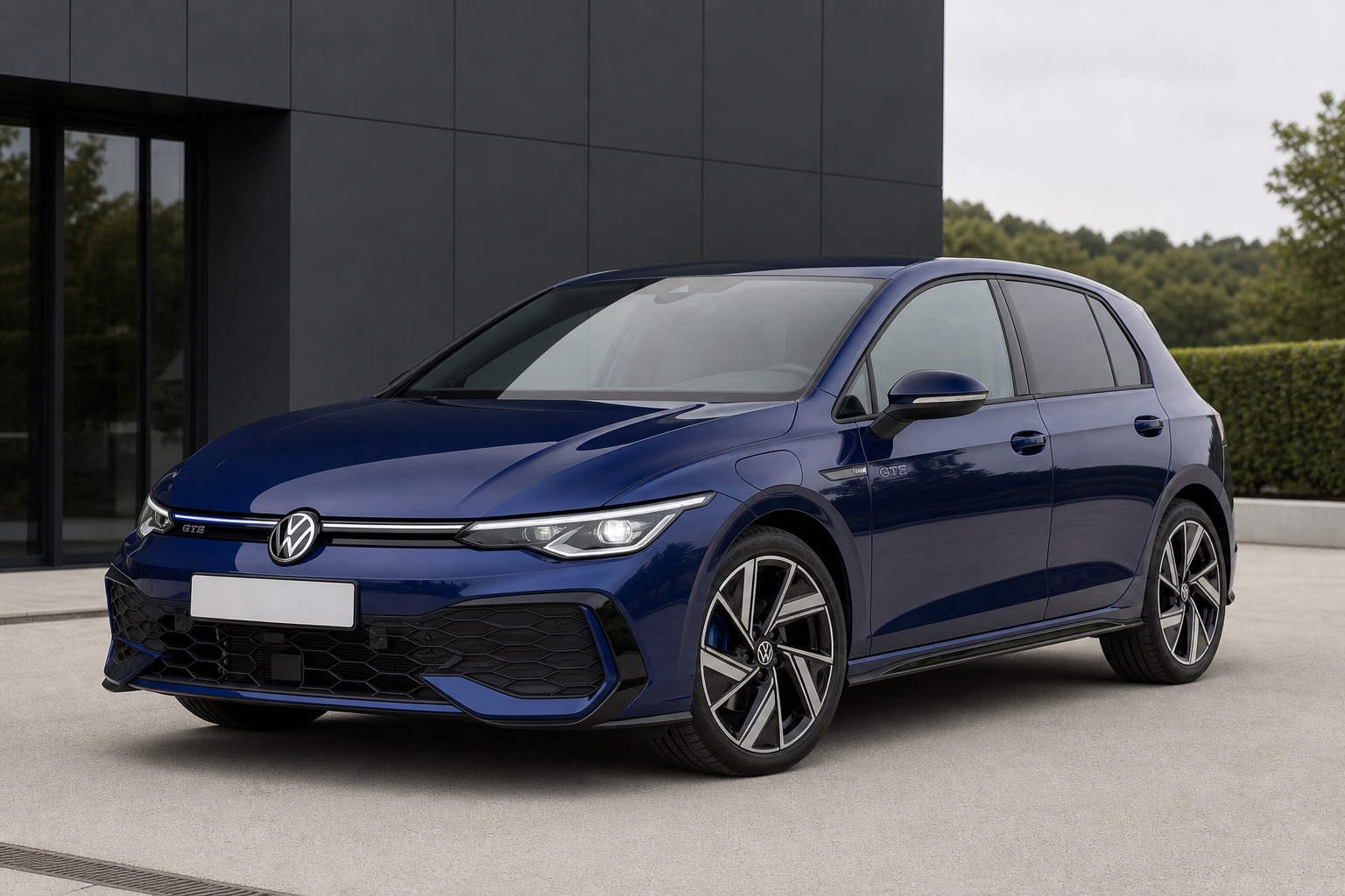 Blue Volkswagen Golf GTE outside a contemporary dealership.