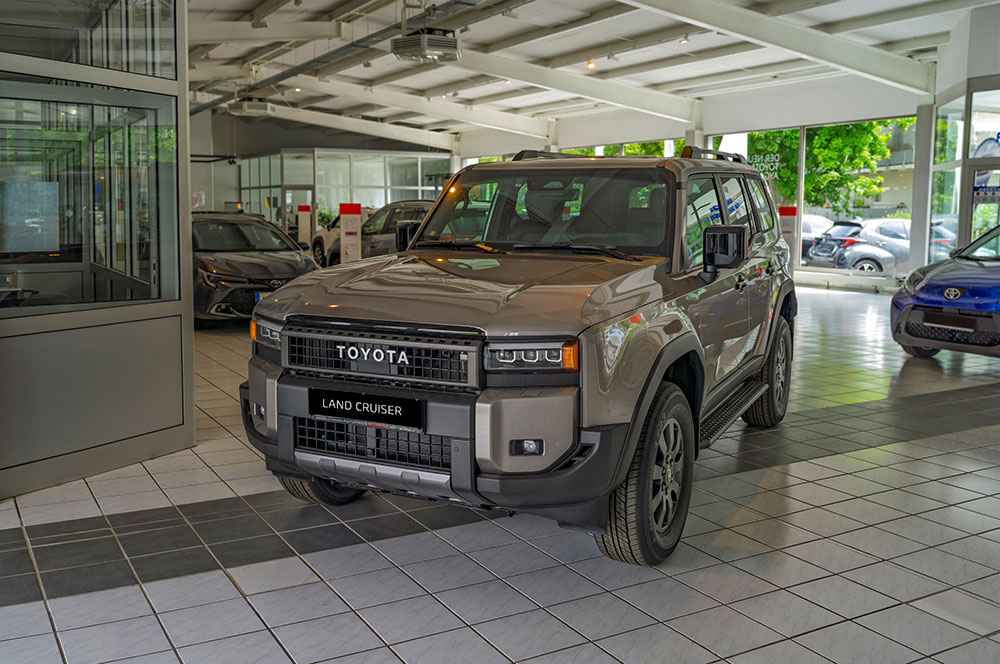 Toyota Land Cruiser displayed inside the Autohaus Bürkle showroom in Frankenthal.
